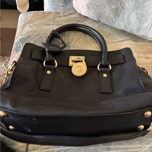 Michael Kors Black Satchel with Gold Accents